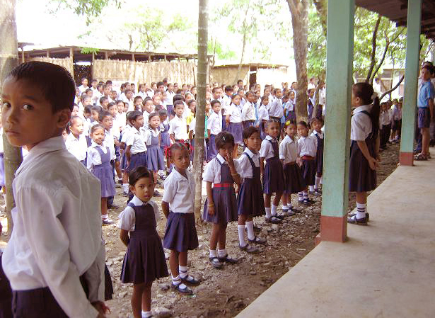 Children standing in a mass queue