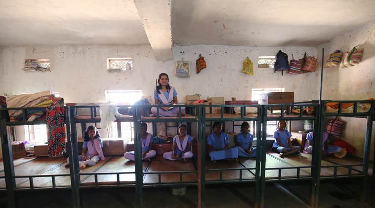 With an annual pass percentage of 100, the Korchamal residential school is one of the schools the district administration holds up as a success model. Rashmita Harijan, on the bunk bed, has been in this school since she was eight years old and calls it her “home” (Photo:Ravi Kanojia)