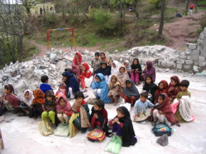 Children studying in an outdoor classroom