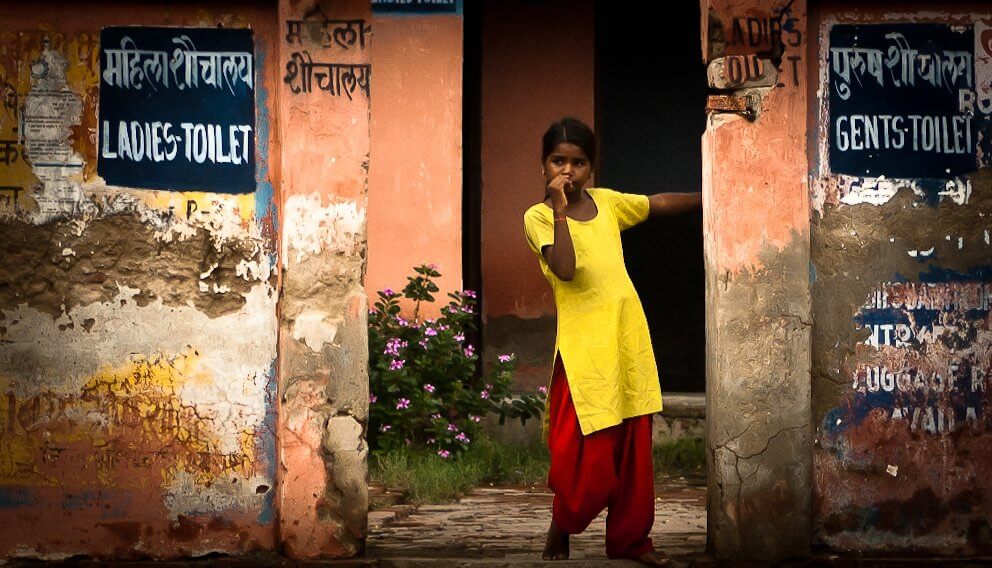 A girl outside ladies toilet 