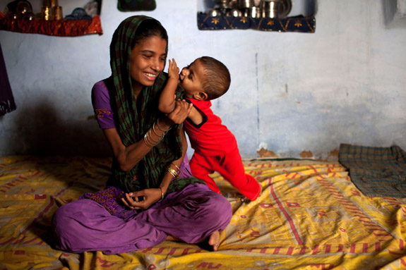 A girl with a baby - Leher NGO in India | Child Rights Organization