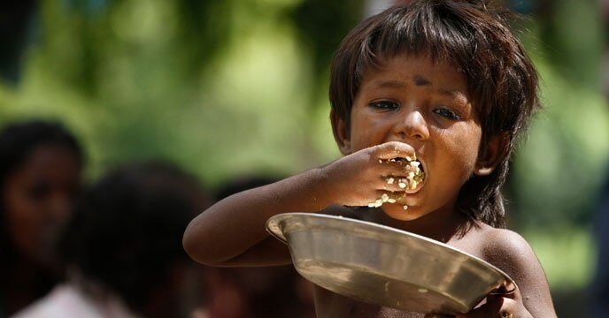 Hungry Child Eating Food