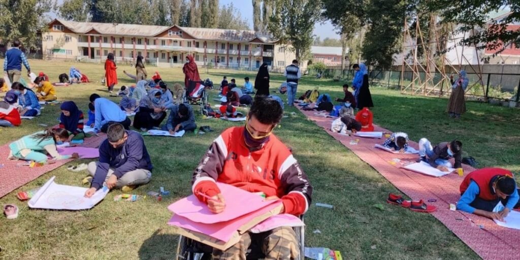 A disabled child drawing