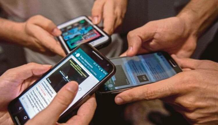 Mobile phones with WhatsApp chats